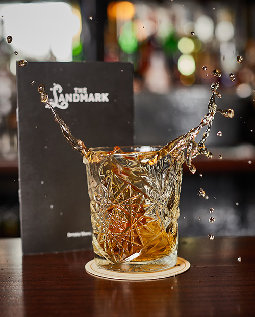 A whiskey tumblr on the bar